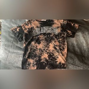 Graphic tee with Bleach pattern.